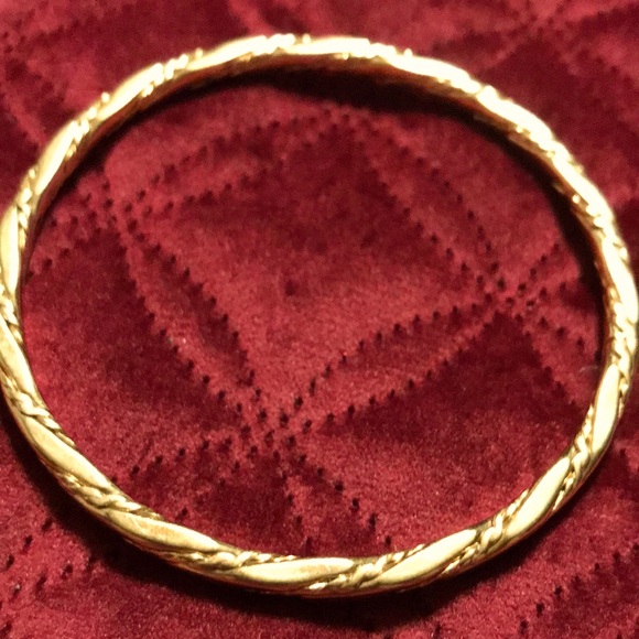 Monet bangle bracelet. Gold plated. 9”. Very pretty design